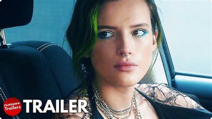 Bella Thorne Sizzles In A Black Bikini Top & Daisy Dukes: Watch