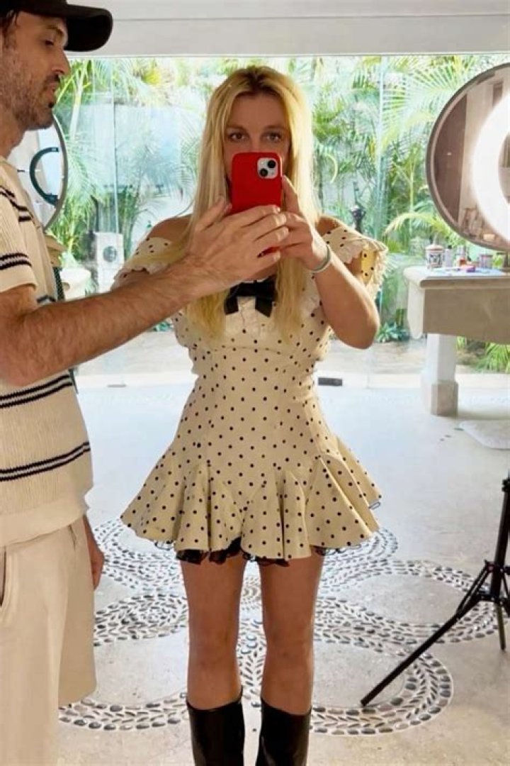 Britney Spears Shows Off Long Hair Makeover While Wearing Nothing But Bikini Bottoms: Watch