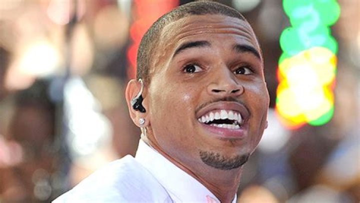Chris Brown Cuddles His Sleeping Son Aeko, 11 Mos, In Sweet New Beach Pic