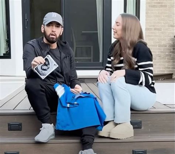 Eminem’s Daughter Hailie Is Ready For Fall In Long-Sleeved Dress: ‘It’s Giving Grinch’