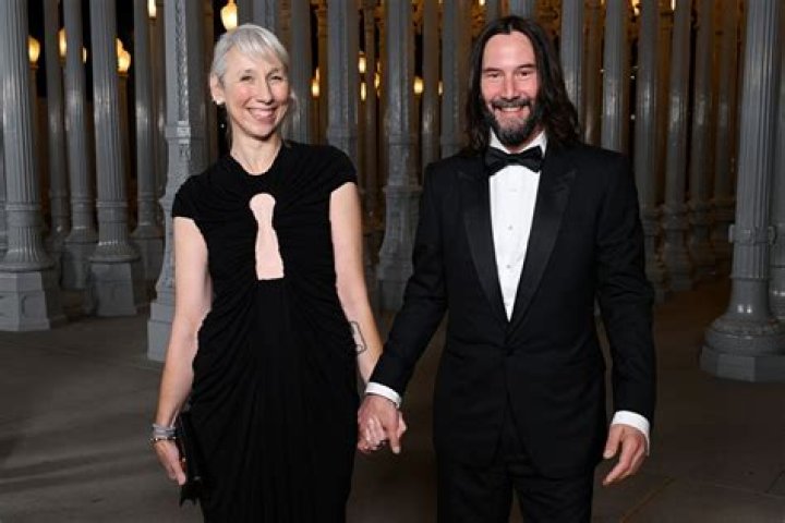 Keanu Reeves, 56, & Alexandra Grant, 47, Are A Clone Couple In Black Jackets During Berlin Stroll — Pic