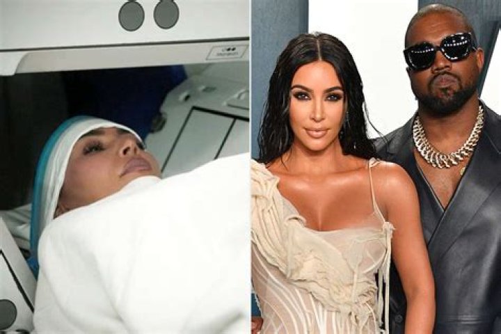 Kim Kardashian Shares Sweet Throwback Pic Of North & Saint Posing On A Private Jet