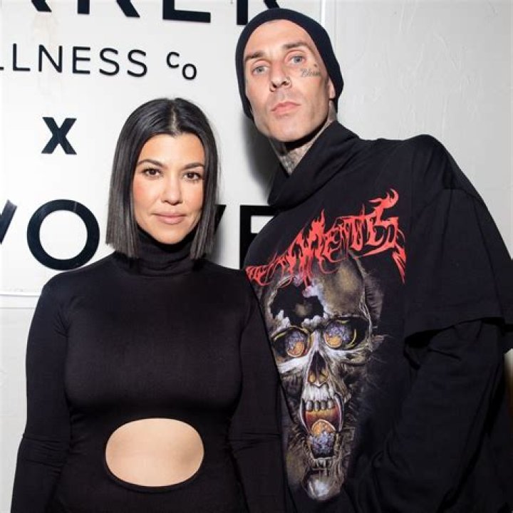 Kourtney Kardashian & Travis Barker Hold Hands In Sweet Pic As They Make Romance IG Official