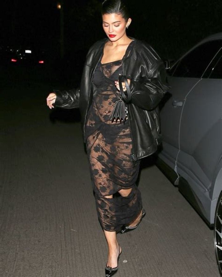 Kylie Jenner Slays In Red & Nude See-Through Dress While Out In Paris: Photos