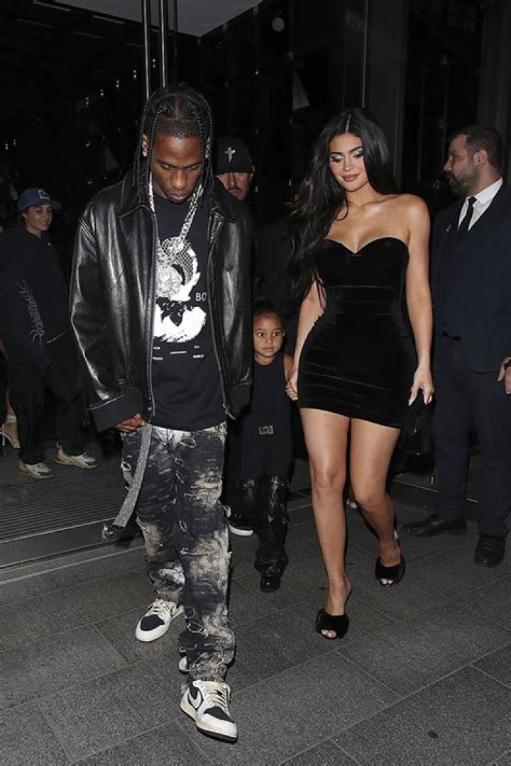 Kylie Jenner & Travis Scott Hold Hands With Stormi On Rare Public Outing Together