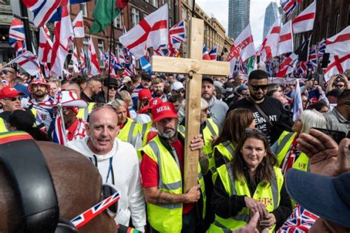 Sacha Baron Cohen Crashes Far-Right Rally & Gets Crowd To Sing Racist Song