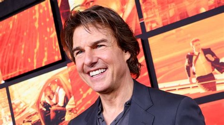 Tom Cruise Goes ‘Back To The Movies’ & Gets Recognized By Fans Despite Wearing A Mask — Watch