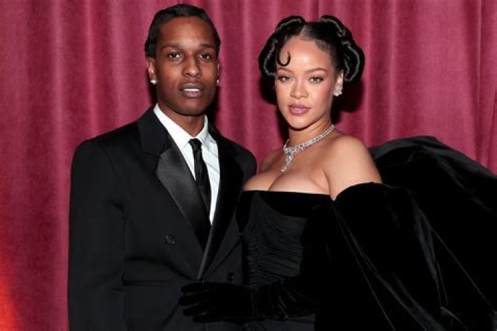 Travis Scott Kisses Rihanna’s Neck At NYFW Party — See The PDA Pics